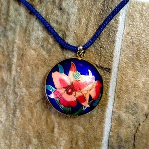 Cloisonné look alike pendant on blue satin cord